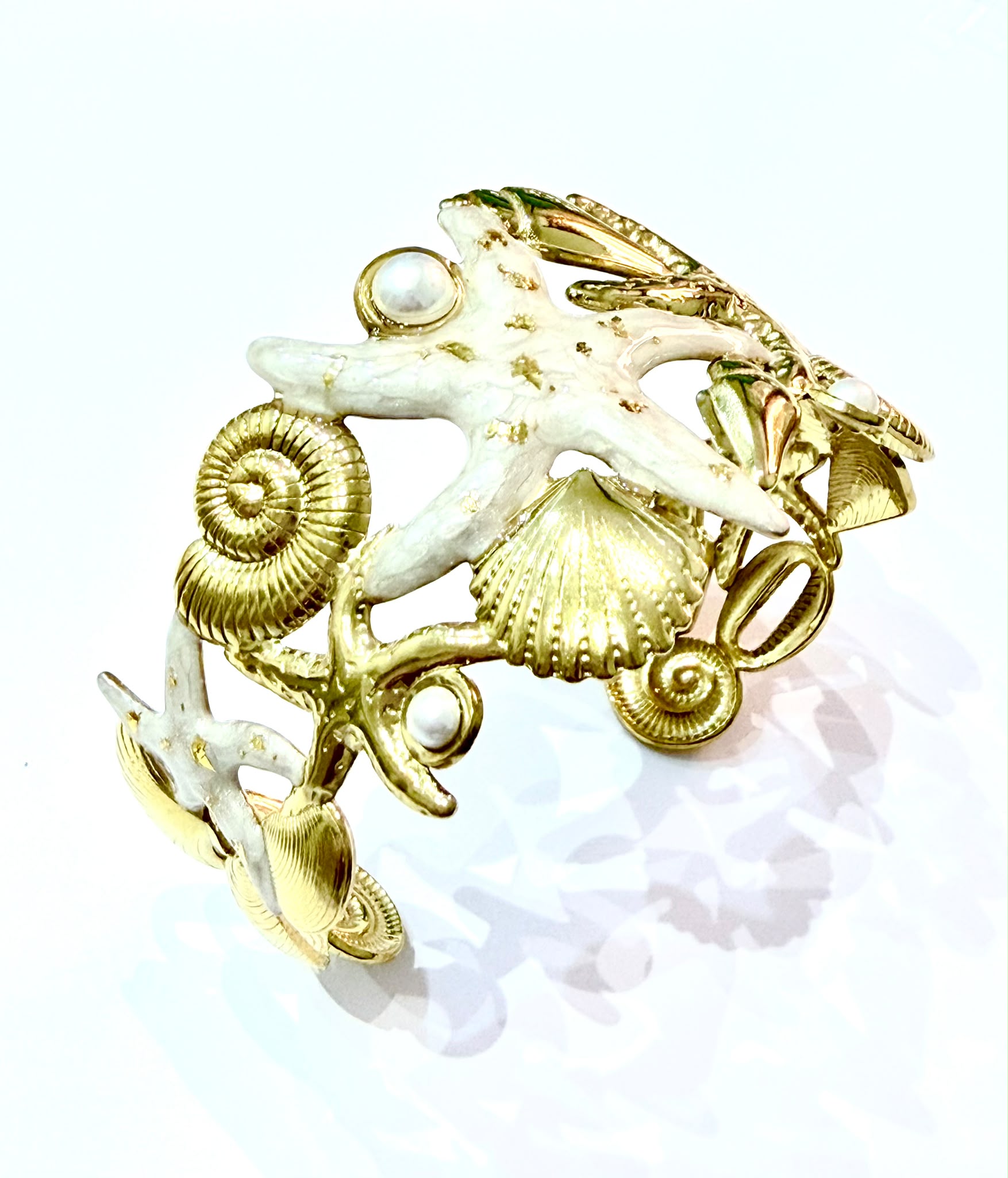 Bracciale rigido stelle marine smaltato bianco/oro
