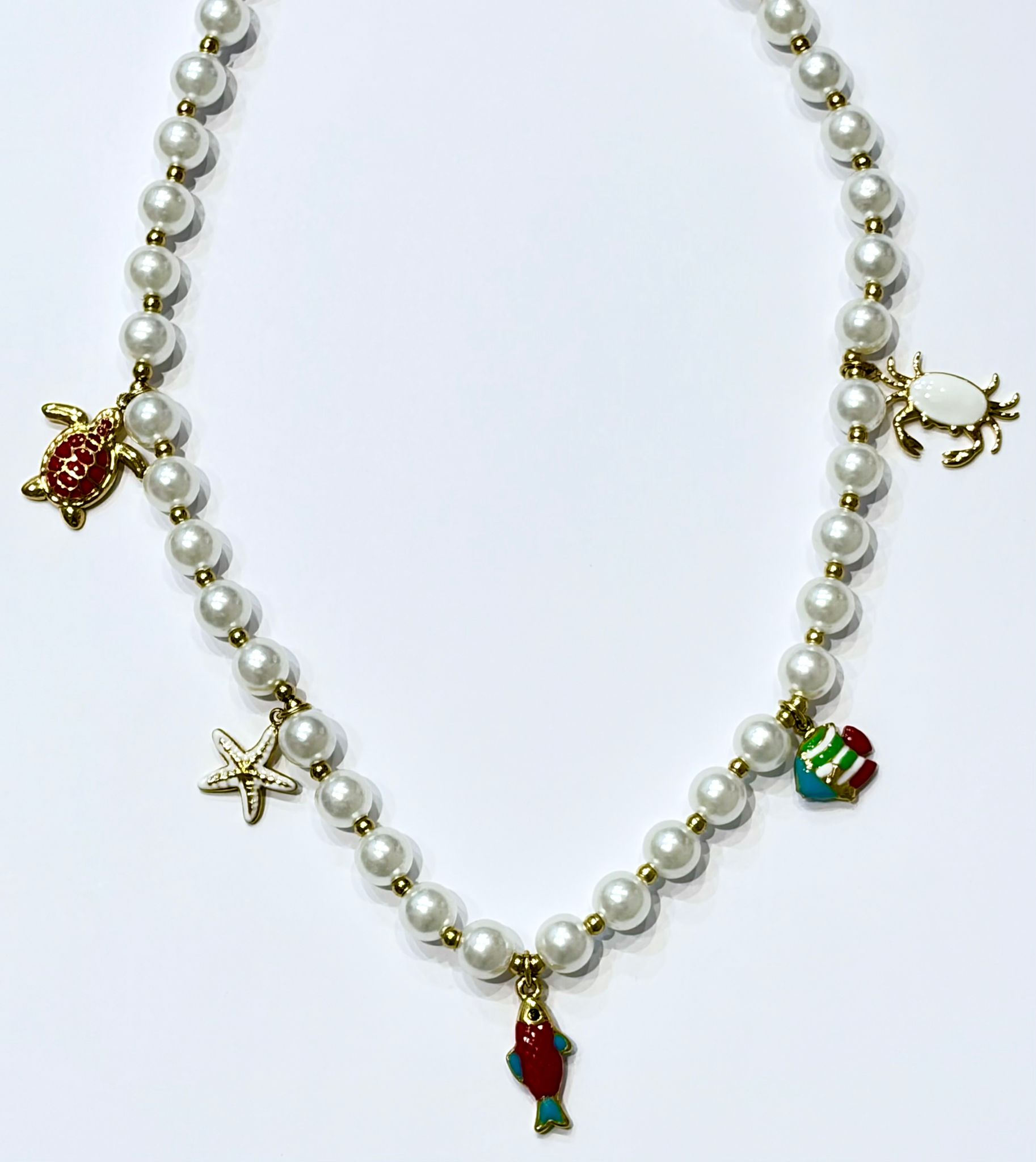 Collana perle soggetti marini